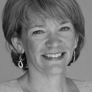 Black and white photo of a woman smiling