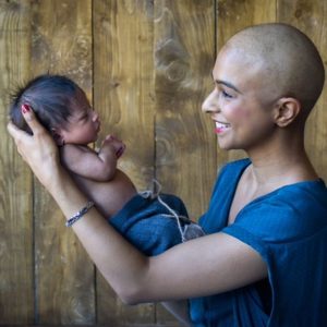 woman holding her baby