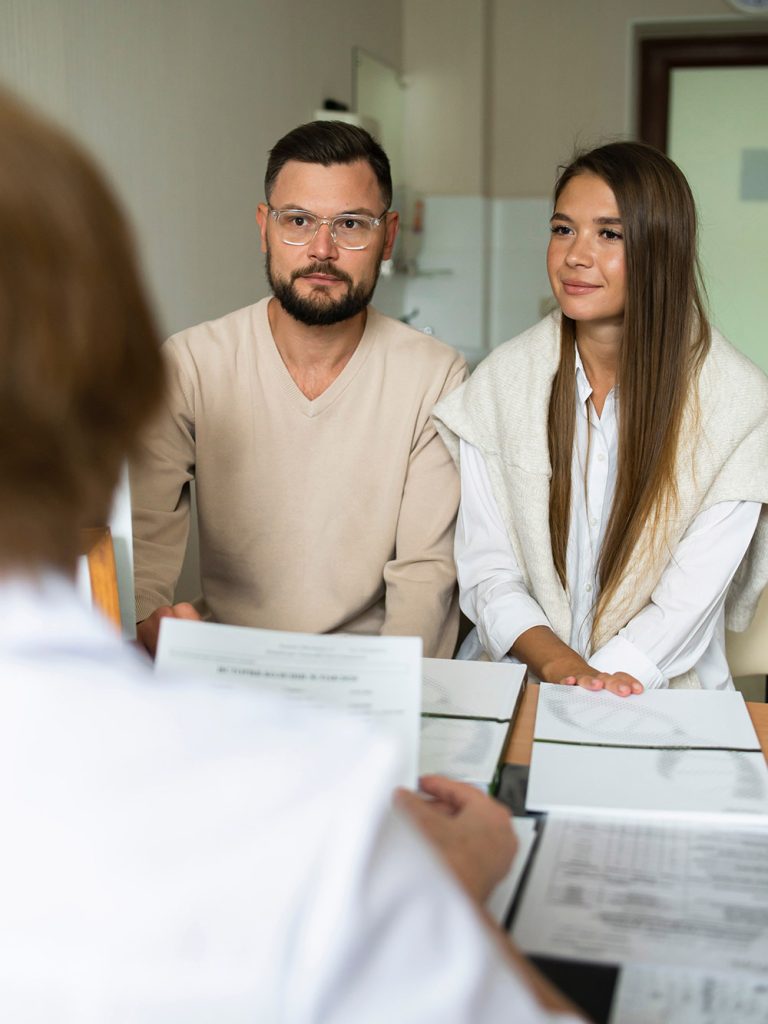 a couple in a doctors office