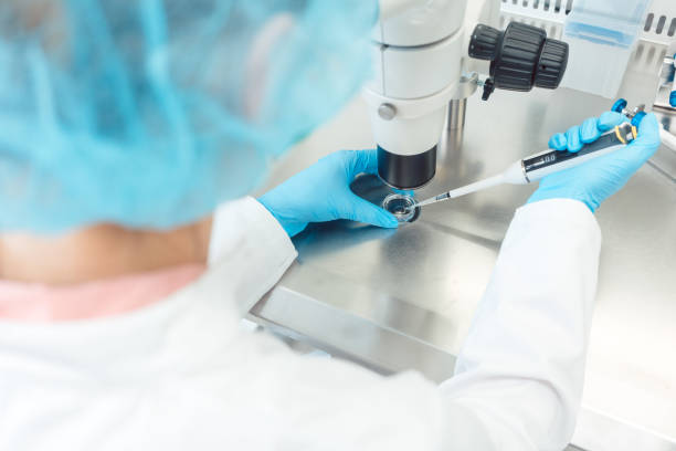 Woman scientist working with a pipette