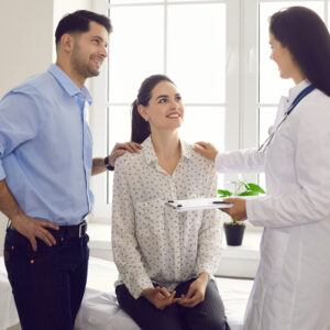 couple listening to doctor