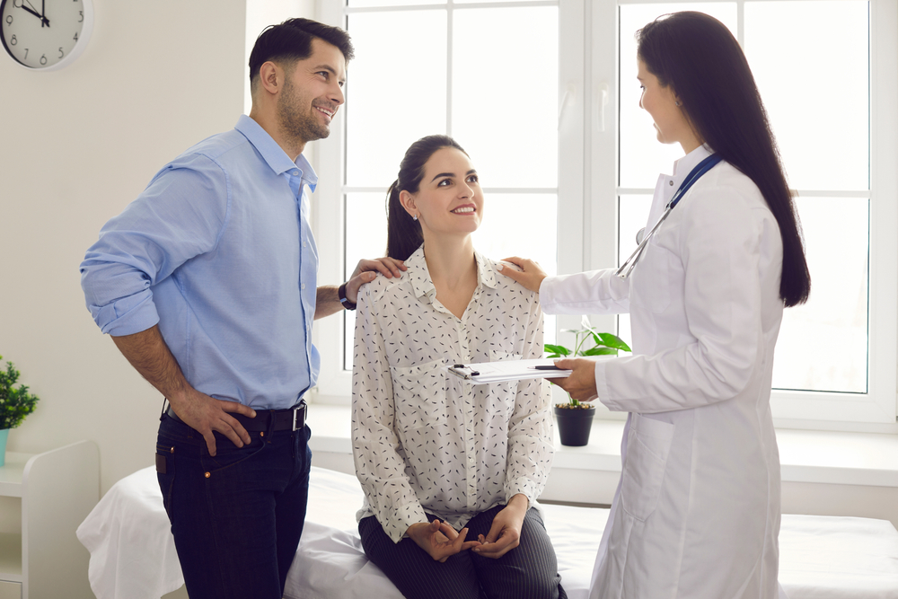 couple listening to doctor