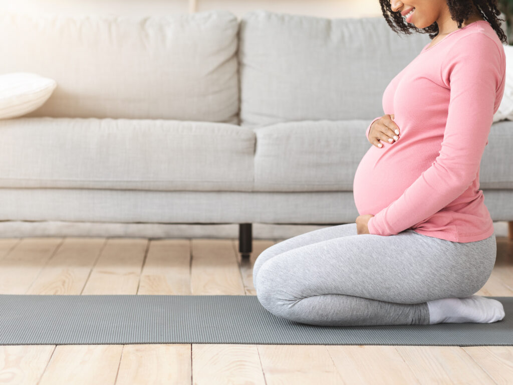 pregnant lady doing yoga