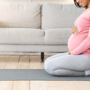 pregnant lady doing yoga